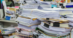 Piles of documents. You need document workflow software.