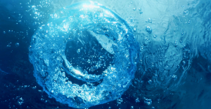 How Rossum works. Under water shot with a blue circle of water, representing the Rossum logo.